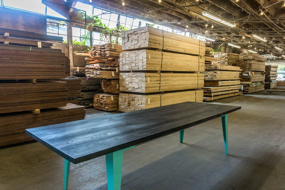 Charred dining table finished using Rubio Monocoat Oil Plus 2C "Pure".