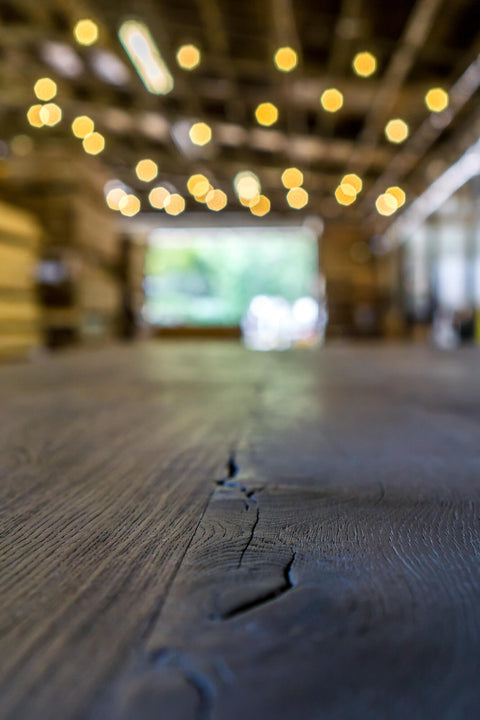 Grain detail on a charred white oak table finished with Rubio Monocoat Oil Plus 2C.