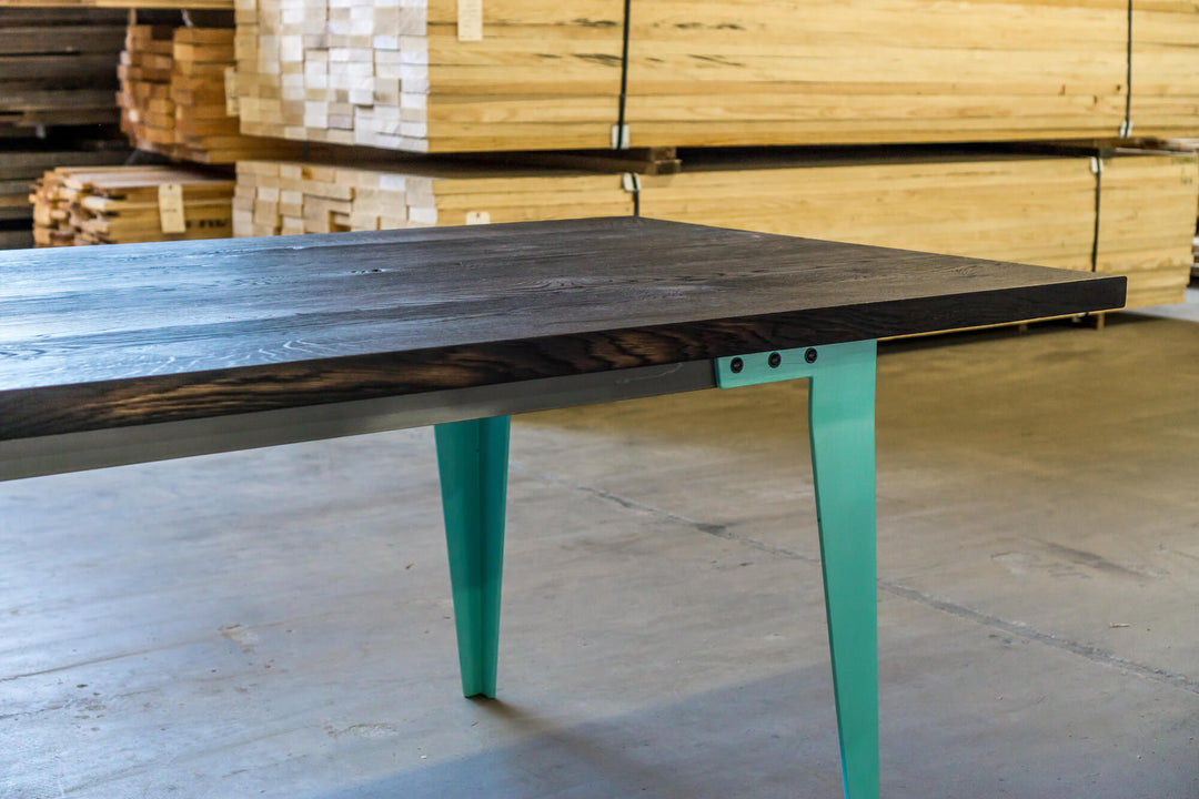 White oak dining table that was charred and finished with Rubio Monocoat Oil Plus 2C.