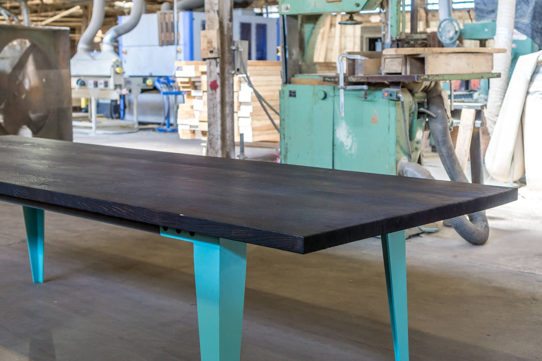Dark oak table that was charred and finished with Rubio Monocoat Oil Plus 2C.