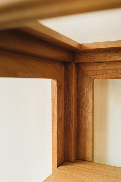 A detail image of the interior of a display cabinet showing where the project is precisely joined.