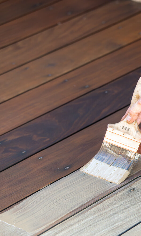 DuroGrit, an exterior wood stain, being applied to cumaru decking