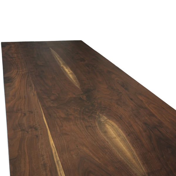 Tabletop on a walnut dining table finished with Rubio Monocoat Oil Plus 2C hardwax oil wood stain and finish.
