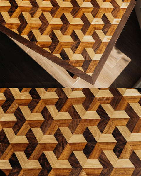 A geometric pattern made from inlaid wood pieces on a walnut desk finished with Rubio Monocoat hardwax oil wood finish.