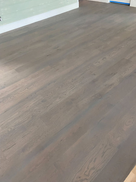White oak flooring treated with Precolor Easy in the color Urban Grey.
