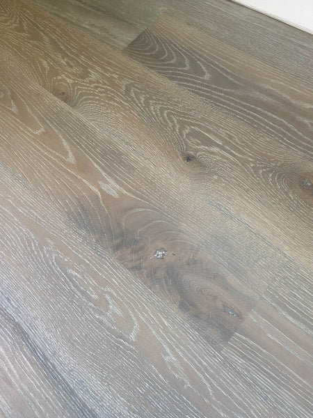 A grey wood floor finished with Rubio Monocoat hardwax oil wood finish.