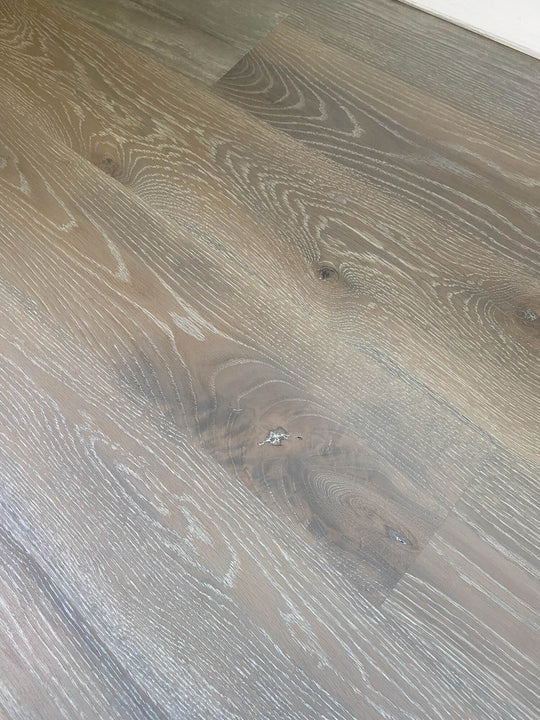 A grey wood floor finished with Rubio Monocoat hardwax oil wood finish.
