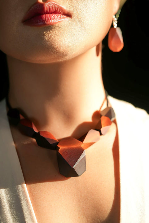 Handcrafted faceted wood necklace and earring in warm copper tone, finished with Rubio Monocoat Oil Plus 2C Pure