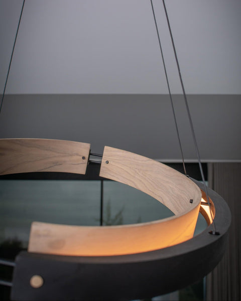 Interior halo of a round wood light fixture finished with Rubio Monocoat Oil Plus 2C.