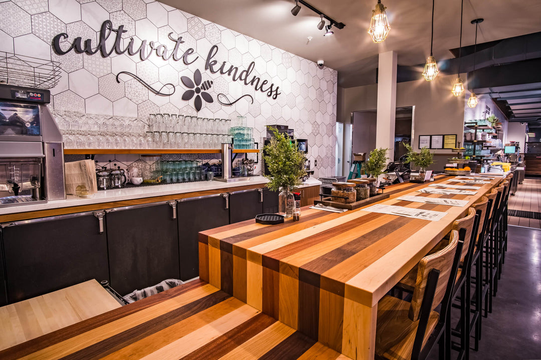 A countertop at a restaurant made from five different wood species and finished  with Rubio Monocoat Oil Plus 2C hardwax oil wood stain and finish.