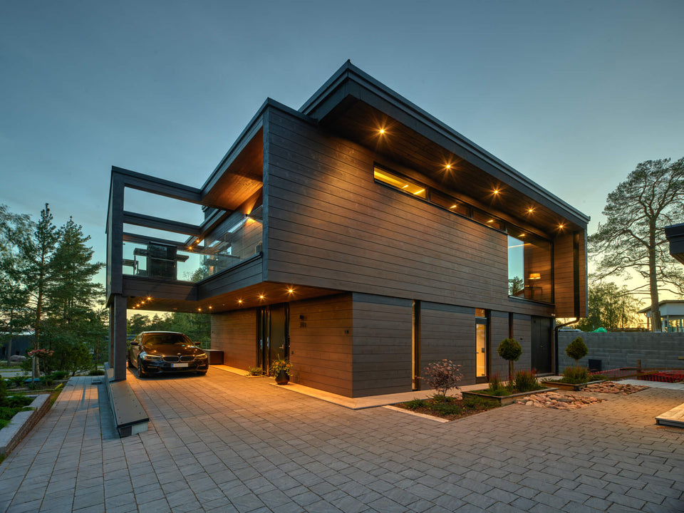 Exterior of a modern home set in a serene landscape.