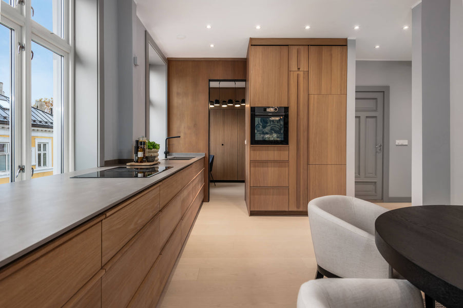 An entire kitchen fitted with oak cabinetry and finished using Oil Plus 2C "Mist 5%" to bring warmth into this contemporary space.