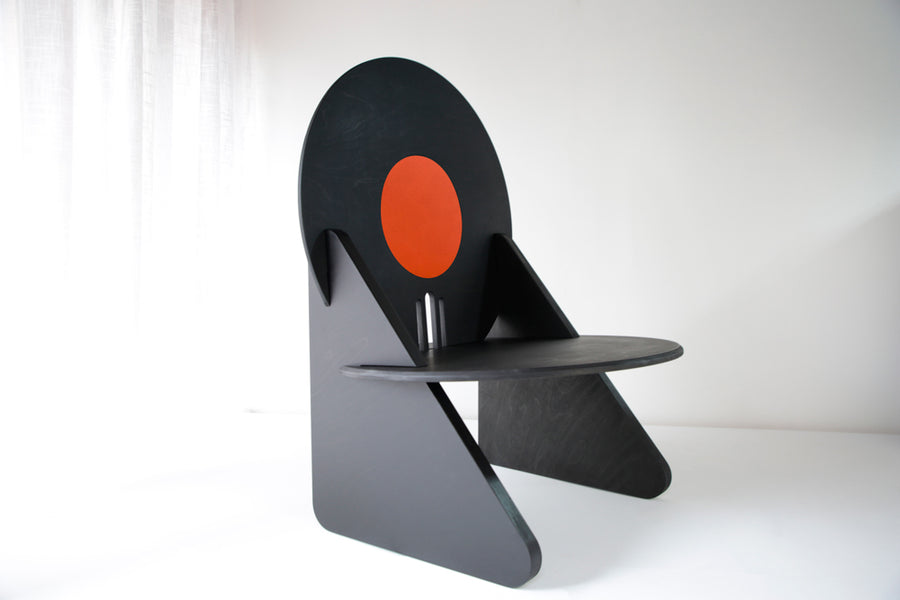 A beautiful, modern black birch chair finished with Rubio Monocoat products.
