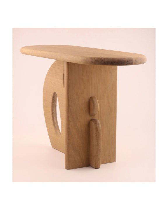 An organic modern side table inspired by nature finished in a durable hardwax oil finish for interior use.