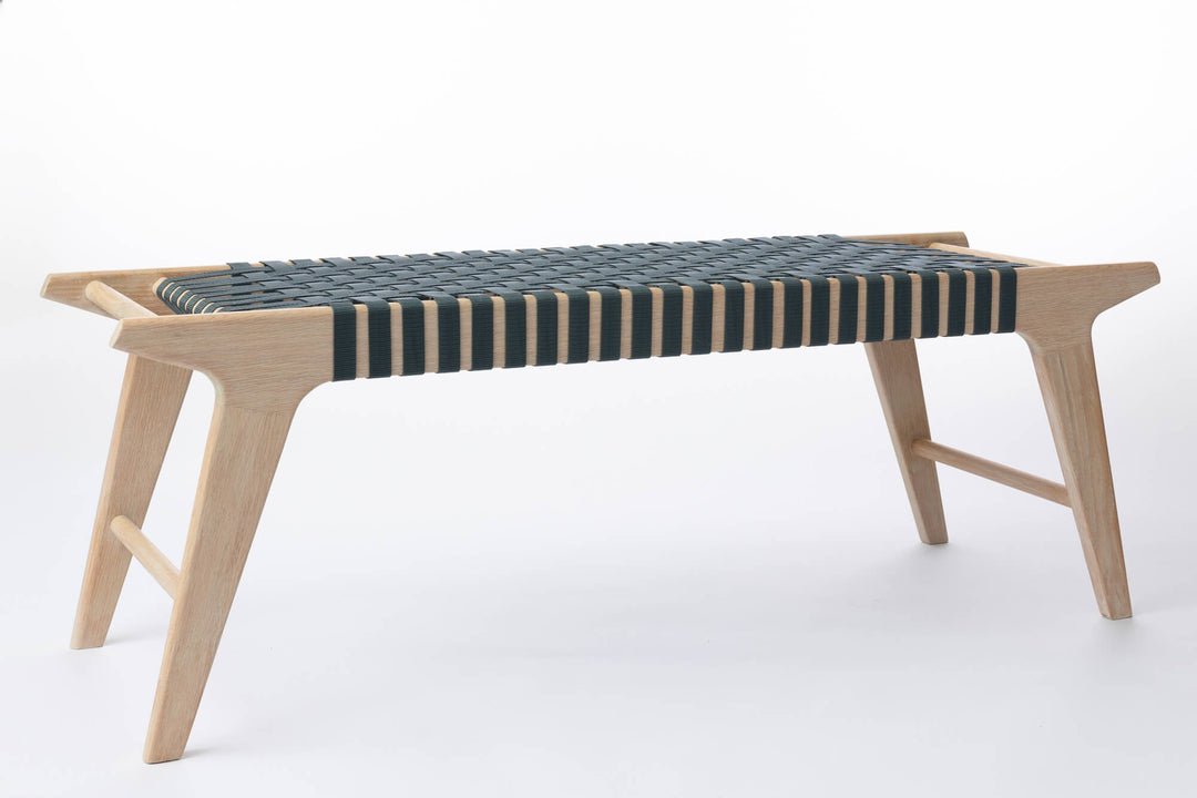 A bench crafted from red oak and finished using Rubio Monocoat Cotton White for a light but natural appearance.