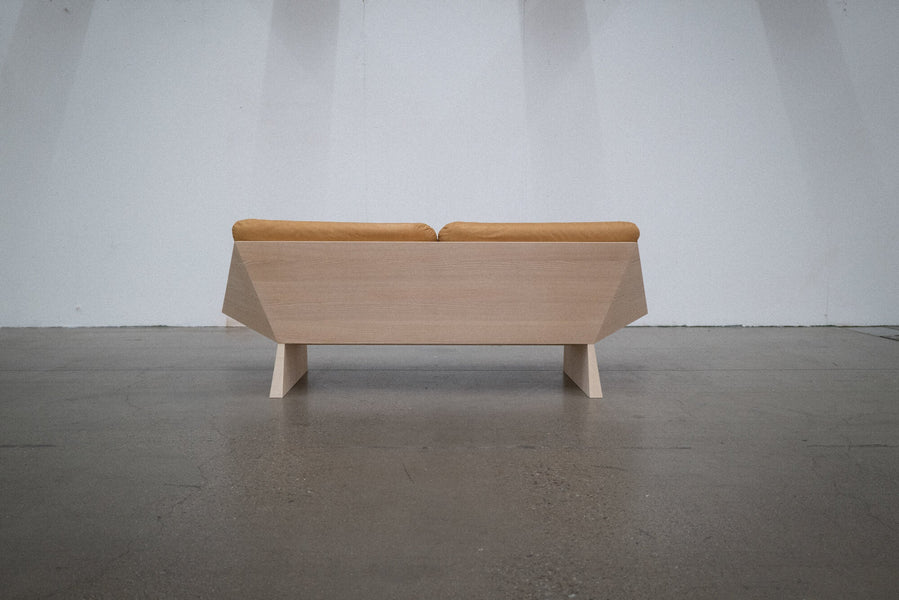 Geometric lines of an ash sofa finished with Oil Plus 2C White 5% hardwax oil wood stain and finish in one.