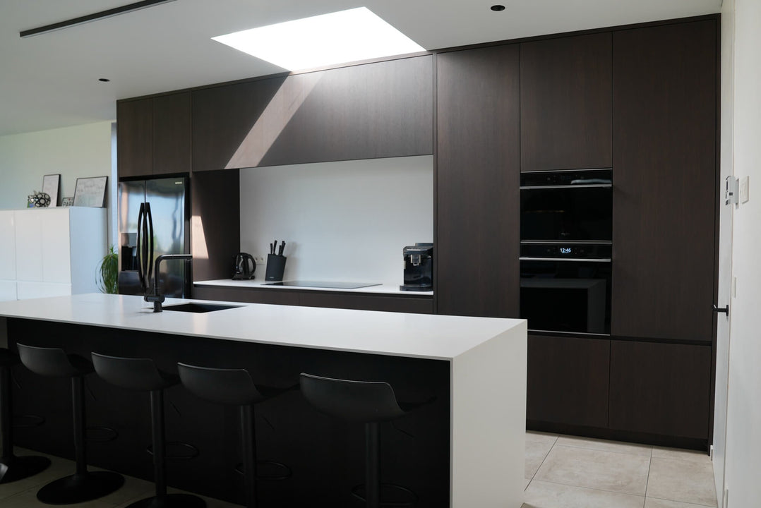 Dark brown oak cabinetry finished with Precolor Easy Mystic Brown wood pretreatment and Oil Plus 2C Black wood finish.