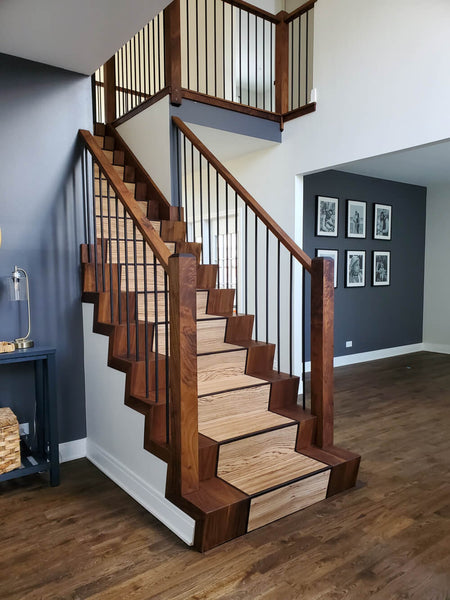 A wood staircase finished with Rubio Monocoat Oil Plus 2C in the colors Pure and Walnut.