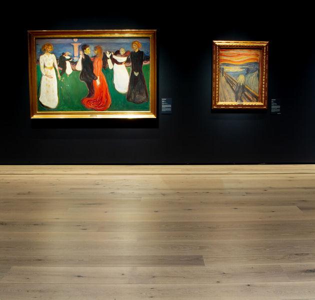 Two paintings at the Norwegian National Museum, one of which is "the Scream", in a dark room with light colored hardwood flooring finished with hardwax oil wood finish from Rubio Monocoat.