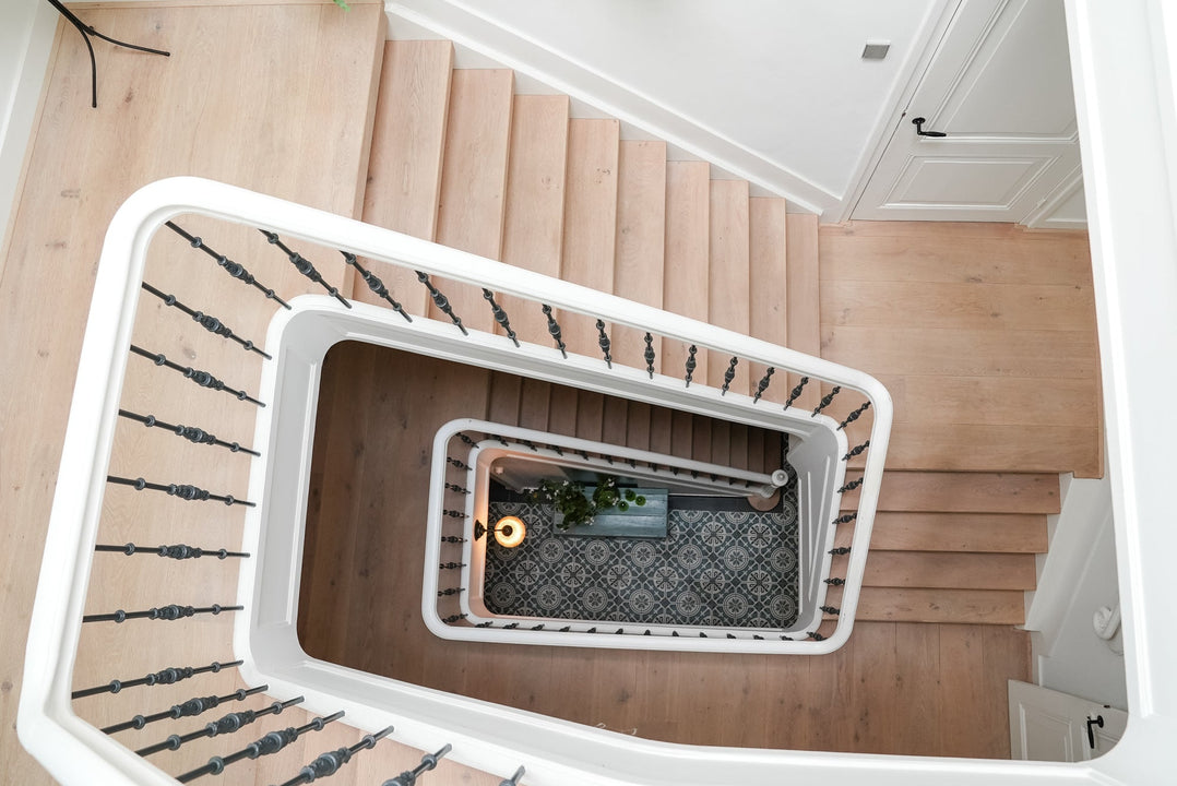 Looking down a white oak staircase finished with a hardwax oil wood finish.
