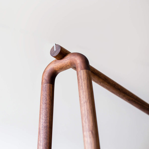 The upper portion of a wardrobe rack made from walnut wood and finished with Oil Plus 2C hardwax oil.