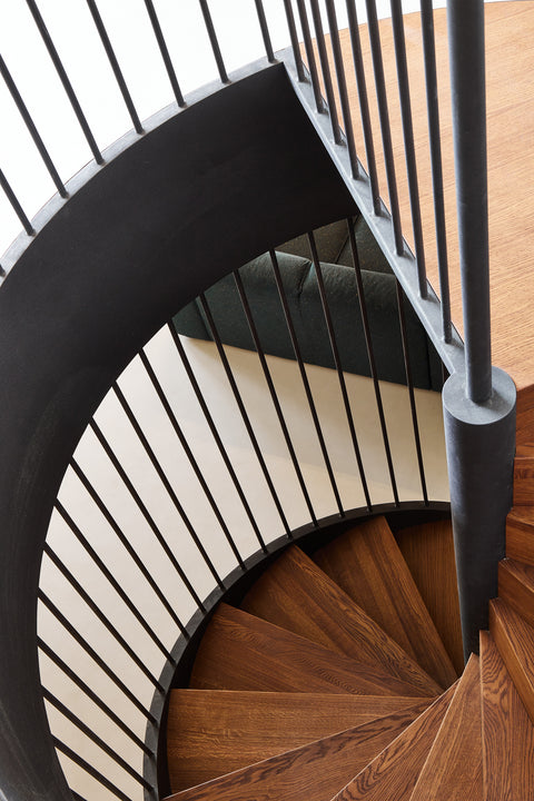 View down a spiral staircase made from oak wood finished with Oil Plus 2C hardwax oil wood finish.