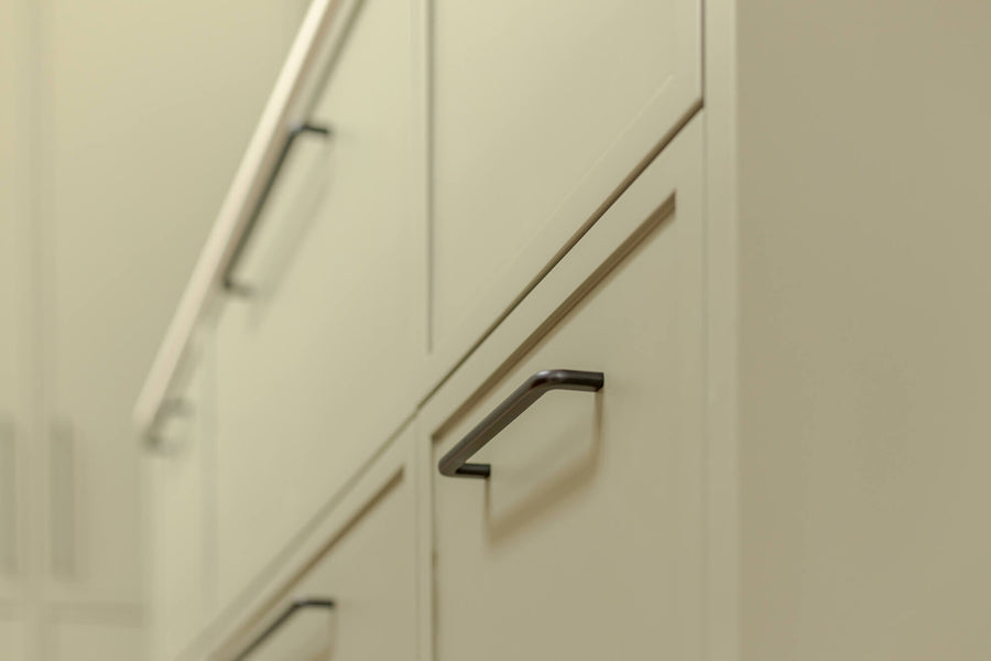 Details on the kitchen drawers in the sage kitchen.