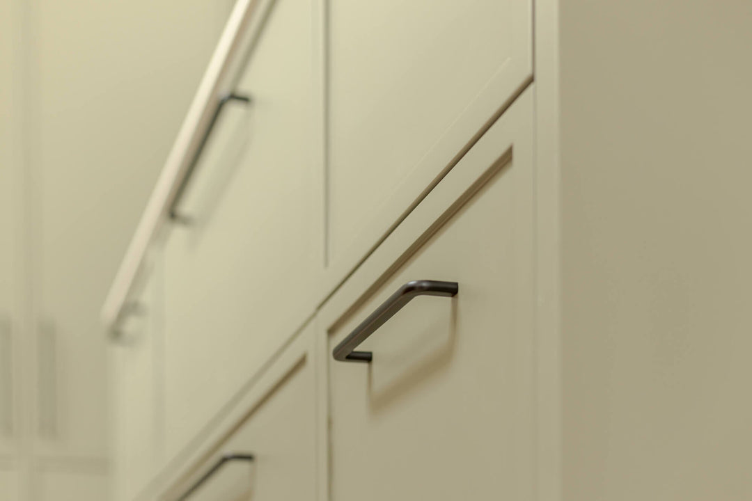 Details on the kitchen drawers in the sage kitchen.