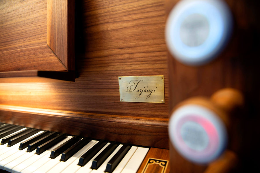 Tarjani organ brand made out of a brass plate fixed to the walnut and European oak organ finished using Rubio Monocoat Oil Plus 2C hardwax oil.