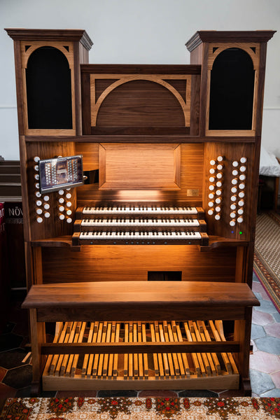 A black walnut and European oak organ finished using Rubio Monocoat Oil Plus 2C Pure hardwax oil wood finish.