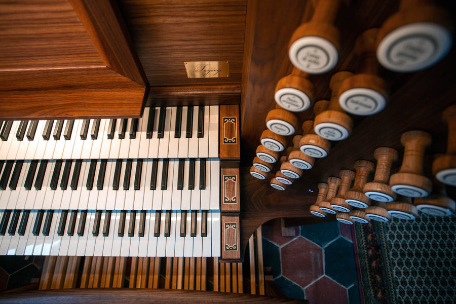 Details on a black walnut and European oak organ finished with a hardwax oil.