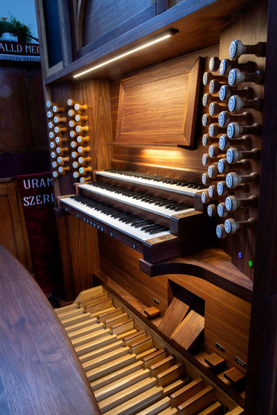 A walnut organ finished with Oil Plus 2C Pure.