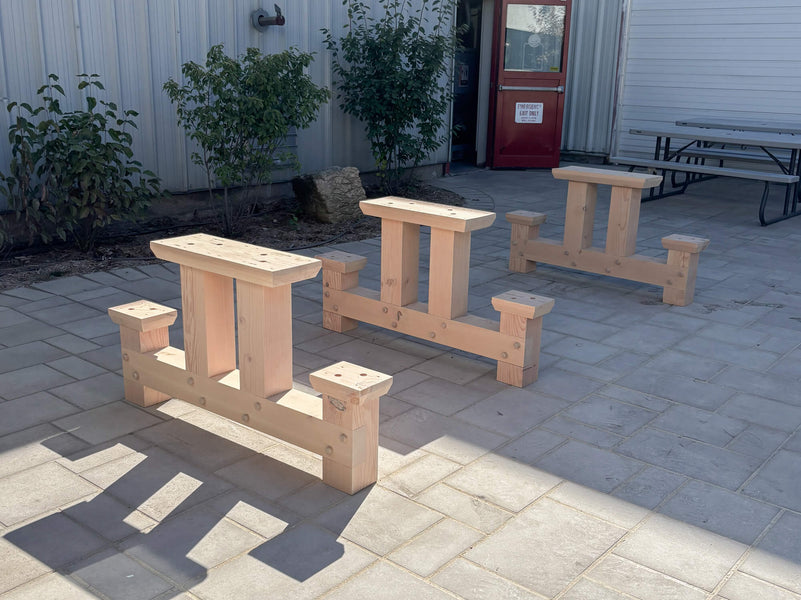 Trestle bases for a massive exterior table made from Douglas Fir and finished with DuroGrit Light Sand".