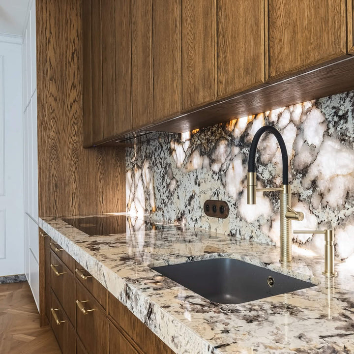 A minimalist kitchen featuring oak cabinetry finished with Rubio Monocoat Oil Plus 2C hardwax oil wood stain and finish.