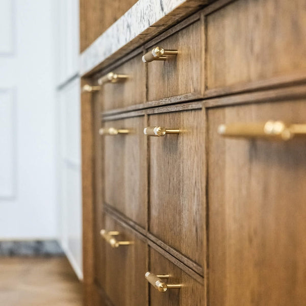 Cabinet drawers in a warm minimalist kitchen finished with Rubio Monocoat Oil Plus 2C "Chocolate".