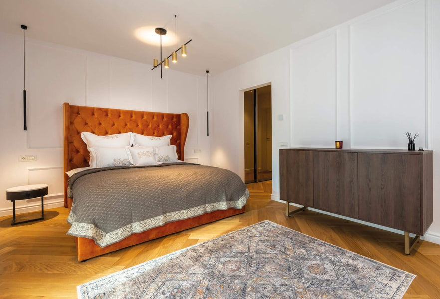 Master bedroom with herringbone wood flooring with Oil Plus 2C wood finish.