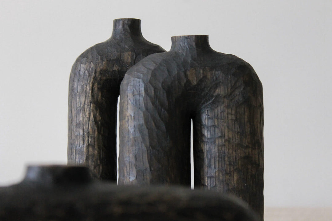 Two wooden vases finished with Rubio Monocoat hardwax oil wood finish.