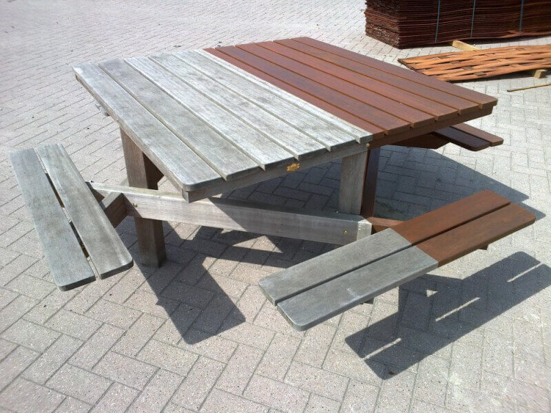 Outdoor wooden picnic table finished with Rubio Monocoat.