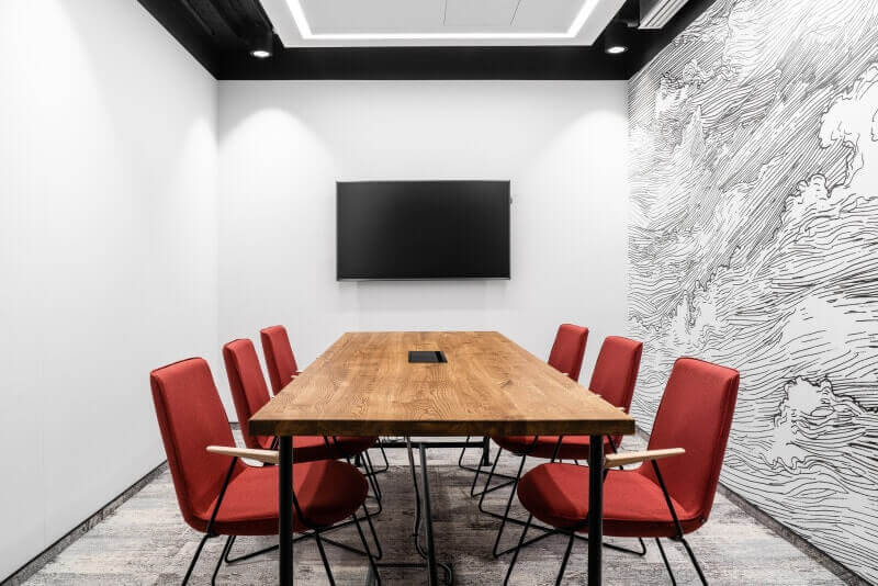 Conference room in design office features wooden conference table finished with Rubio Monocoat hardwax oil.