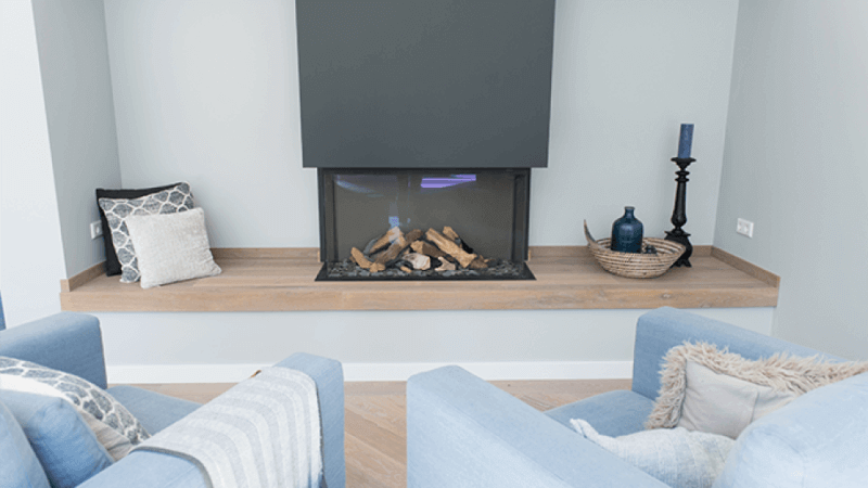 A living room with light oak herringbone flooring that is finished using Rubio Monocoat.