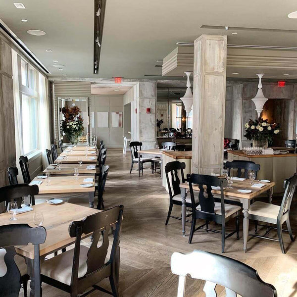 Restaurant boasts wooden tables and chairs made by Lighthouse Boston Woodworks and finished with Rubio Monocoat products.