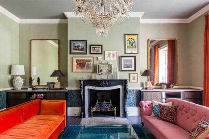Eclectic living room with bold colored furniture.