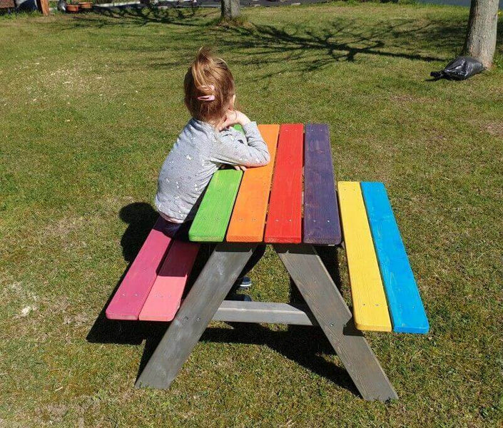 Childrens' picnic bench made with wood finished with colorful Rubio Monocoat products.