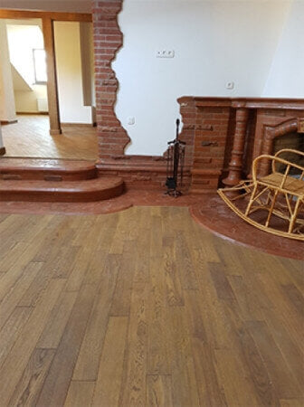 Brick and wood flooring and stairs.
