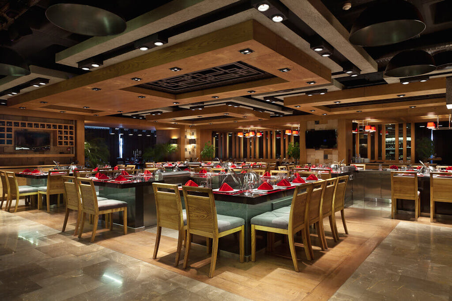 Teppanyaki restaurant with wood panels for decor.