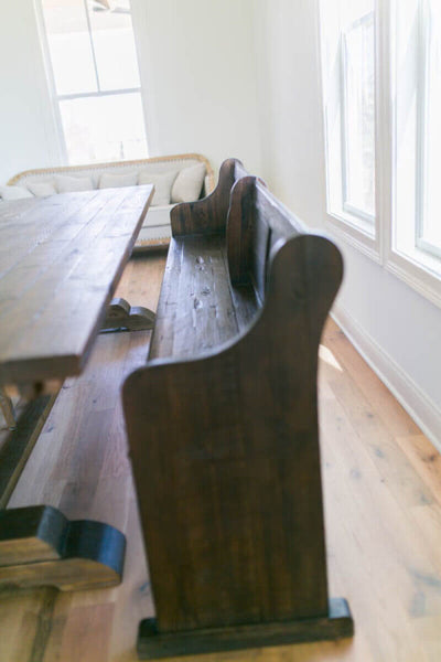 Vintage table in dining room featuring reclaimed oak flooring finished with Rubio Monocoat.