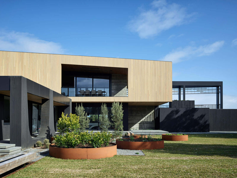 The backside of Canadian Bay featuring charred cypress wood finished with Rubio Monocoat Products.