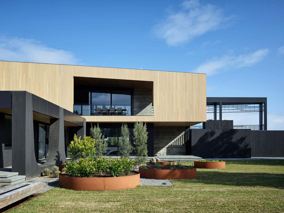 The backside of Canadian Bay featuring charred cypress wood finished with Rubio Monocoat Products.