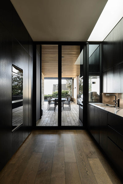 Exit to exterior of a vacation home featuring french oak flooring finished with Rubio Monocoat hardwax oil.
