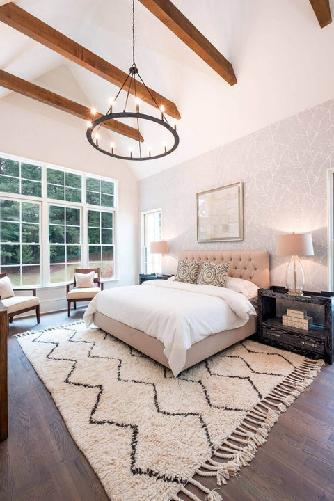 Bedroom features white oak flooring finished with hardwax oil by Rubio Monocoat.